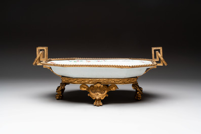 A Chinese famille rose dish with a crane among flowering branches with bronze mount, Qianlong