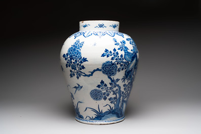 A large blue and white Dutch Delft Kangxi-style chinoiserie 'pheasant among peonies' vase, early 18th C.
