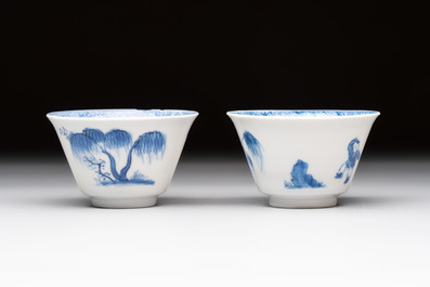 A pair of Chinese blue and white 'Elegant Beauty and Boy' cups and saucers, Chenghua mark, Kangxi