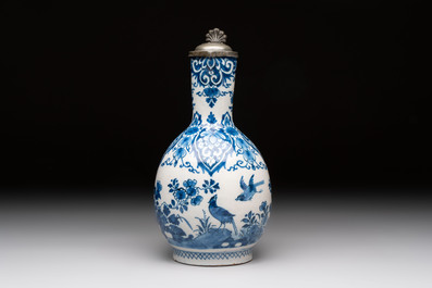 A blue and white Dutch Delft jug with pewter cover, 1st quarter 18th C.