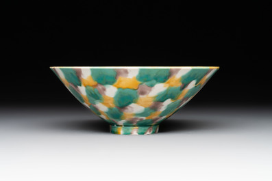 A pair of Chinese polychrome lions, a celadon-glazed goat, a yellow-glazed bowl and a sancai-glazed conical bowl, Chenghua mark, 19/20th C.