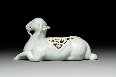 A pair of Chinese polychrome lions, a celadon-glazed goat, a yellow-glazed bowl and a sancai-glazed conical bowl, Chenghua mark, 19/20th C.