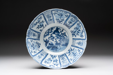 A Chinese blue and white 'kraak' bowl with ducks and flowers, Wanli