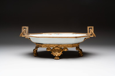 A Chinese famille rose dish with a crane among flowering branches with bronze mount, Qianlong
