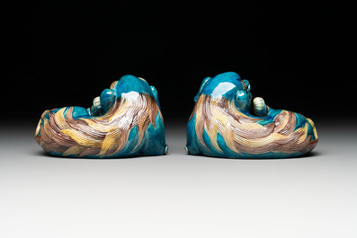 A pair of Chinese polychrome lions, a celadon-glazed goat, a yellow-glazed bowl and a sancai-glazed conical bowl, Chenghua mark, 19/20th C.