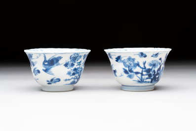 Eight Chinese blue, white and iron-red cups and twelve saucers, Kangxi/Yongzheng