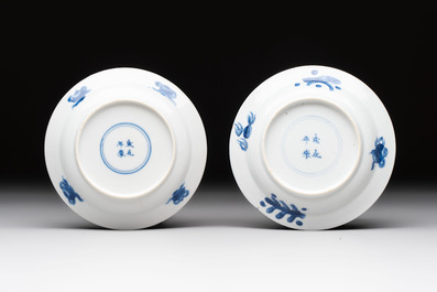 A pair of Chinese blue and white 'elegant beauty and boy' cups and saucers, Chenghua mark, Kangxi