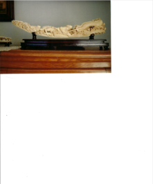 A Chinese ivory carving depicting a Luohan and a dragon, 'Da Ming 大明' mark, 19/20th C.