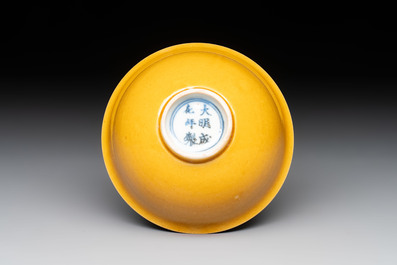 A pair of Chinese polychrome lions, a celadon-glazed goat, a yellow-glazed bowl and a sancai-glazed conical bowl, Chenghua mark, 19/20th C.