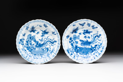 Eight Chinese blue, white and iron-red cups and twelve saucers, Kangxi/Yongzheng