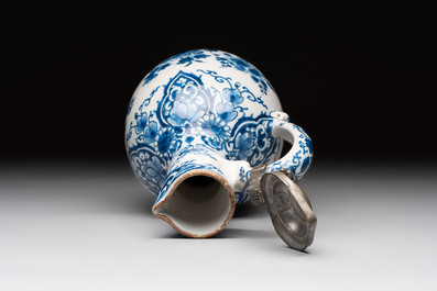 A blue and white Dutch Delft jug with pewter cover, 1st quarter 18th C.
