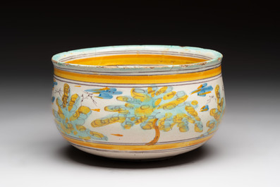 A large polychrome Spanish pottery dish and a bowl with a bird, Talavera, 18th C.