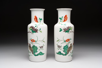 A pair of Chinese famille verte 'quails in blossoming landscape' rouleau vases, 19th C.