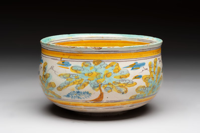 A large polychrome Spanish pottery dish and a bowl with a bird, Talavera, 18th C.