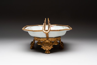 A Chinese famille rose dish with a crane among flowering branches with bronze mount, Qianlong