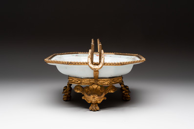 A Chinese famille rose dish with a crane among flowering branches with bronze mount, Qianlong