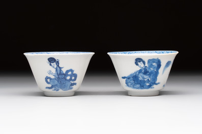 A pair of Chinese blue and white 'Elegant Beauty and Boy' cups and saucers, Chenghua mark, Kangxi