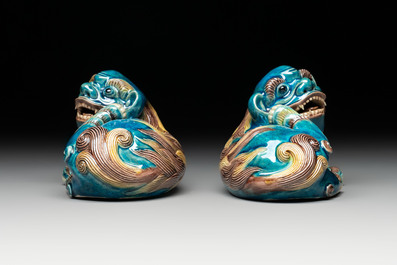 A pair of Chinese polychrome lions, a celadon-glazed goat, a yellow-glazed bowl and a sancai-glazed conical bowl, Chenghua mark, 19/20th C.
