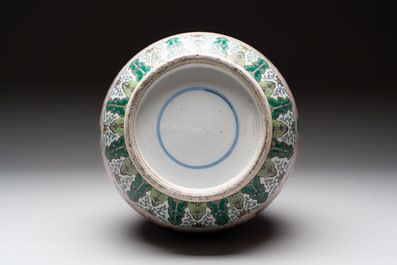 A Chinese famille verte bottle vase, 19th C.