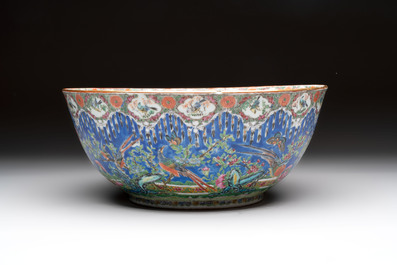 A Chinese Canton famille rose 'peacock' punch bowl, 19th C.