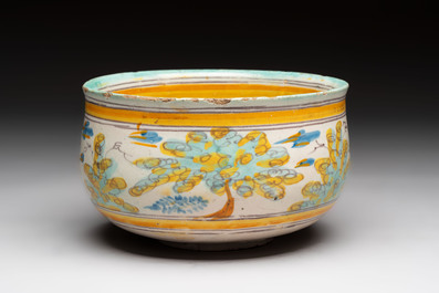 A large polychrome Spanish pottery dish and a bowl with a bird, Talavera, 18th C.