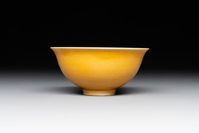 A pair of Chinese polychrome lions, a celadon-glazed goat, a yellow-glazed bowl and a sancai-glazed conical bowl, Chenghua mark, 19/20th C.