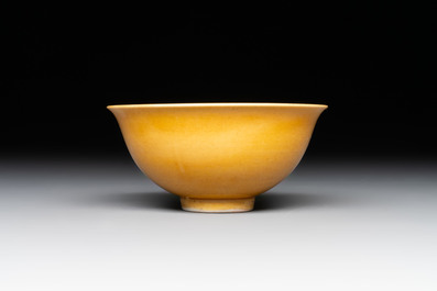 A pair of Chinese polychrome lions, a celadon-glazed goat, a yellow-glazed bowl and a sancai-glazed conical bowl, Chenghua mark, 19/20th C.