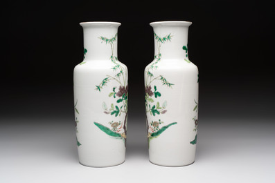 A pair of Chinese famille verte 'quails in blossoming landscape' rouleau vases, 19th C.