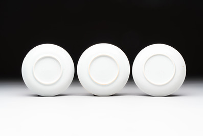 Eight Chinese blue, white and iron-red cups and twelve saucers, Kangxi/Yongzheng