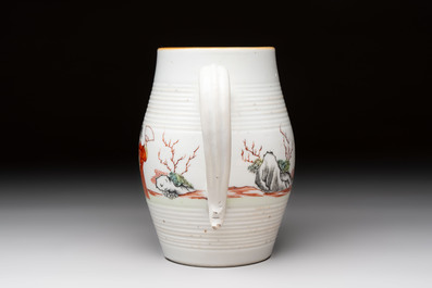 A Chinese famille rose 'mandarin subject' teapot and a mug, Qianlong