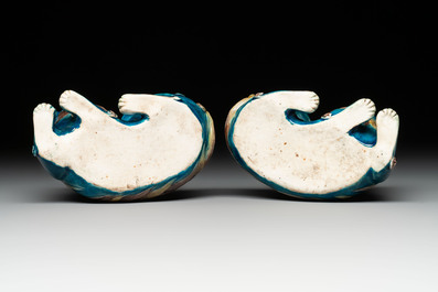 A pair of Chinese polychrome lions, a celadon-glazed goat, a yellow-glazed bowl and a sancai-glazed conical bowl, Chenghua mark, 19/20th C.