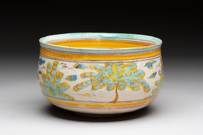 A large polychrome Spanish pottery dish and a bowl with a bird, Talavera, 18th C.