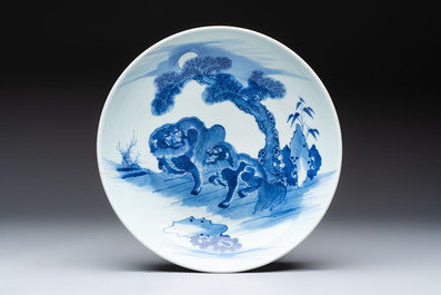 A Chinese blue, white and copper-red 'Three Friends of Winter' jar, and a blue and white 'Buddhist lion' dish, 18th C.