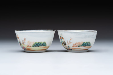 A pair of Chinese famille rose 'European subject' cups and saucers, Qianlong