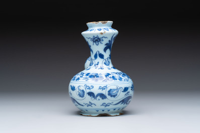A blue and white Dutch Delft chinoiserie kendi, late 17th C.
