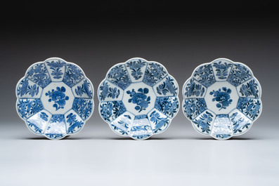 Three Japanese blue and white flower-shaped plates and a 'fisherman' dish, Edo, 17/18th C.