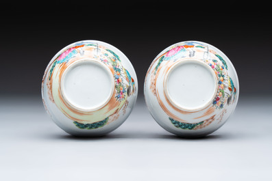 A pair of Chinese famille rose 'European subject' cups and saucers, Qianlong