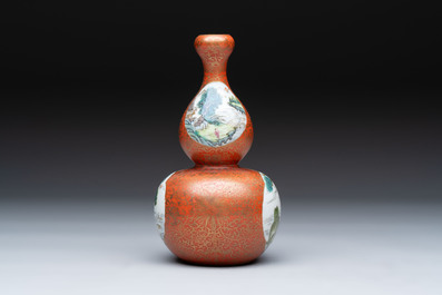 A Chinese famille rose coral-red-ground 'landscape' gourd vase, Qianlong mark, Republic
