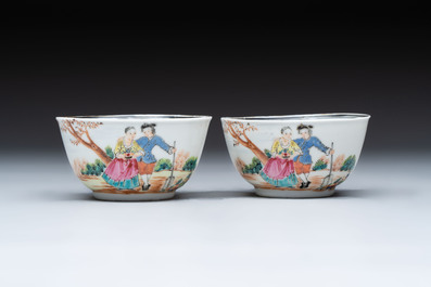 A pair of Chinese famille rose 'European subject' cups and saucers, Qianlong