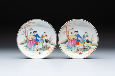 A pair of Chinese famille rose 'European subject' cups and saucers, Qianlong
