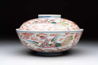 A Chinese famille rose 'dragon and phoenix' bowl and cover, Jiaqing mark and of the period