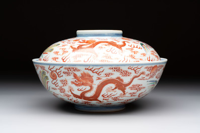 A Chinese famille rose 'dragon and phoenix' bowl and cover, Jiaqing mark and of the period