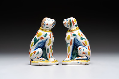 A pair of polychrome Dutch Delft dogs, 18th C.