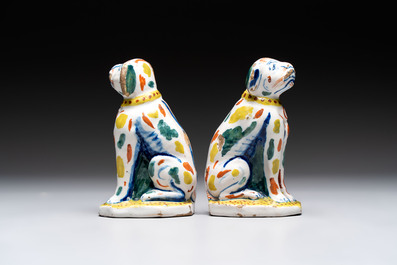 A pair of polychrome Dutch Delft dogs, 18th C.