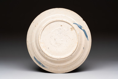 Three blue and white Spanish pottery plates, a dish and a tazza with floral design, Talavera, 19th C.