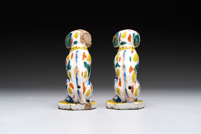 A pair of polychrome Dutch Delft dogs, 18th C.