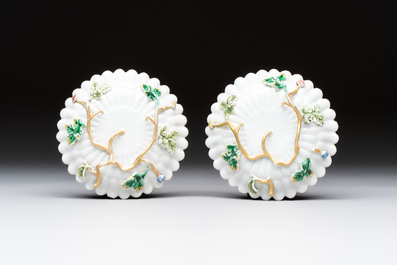 Two Chinese gilt-decorated famille rose cups and saucers with floral design, Qianlong