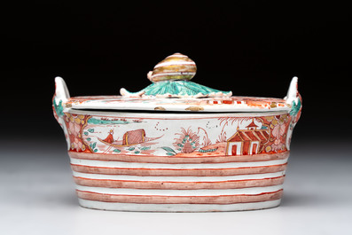 A Dutch Delft petit feu butter tub with a snail finial, 18th C.