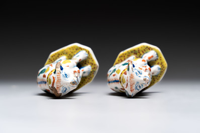 A pair of polychrome Dutch Delft dogs, 18th C.