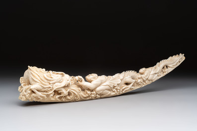 A Chinese ivory carving depicting a Luohan and a dragon, 'Da Ming 大明' mark, 19/20th C.